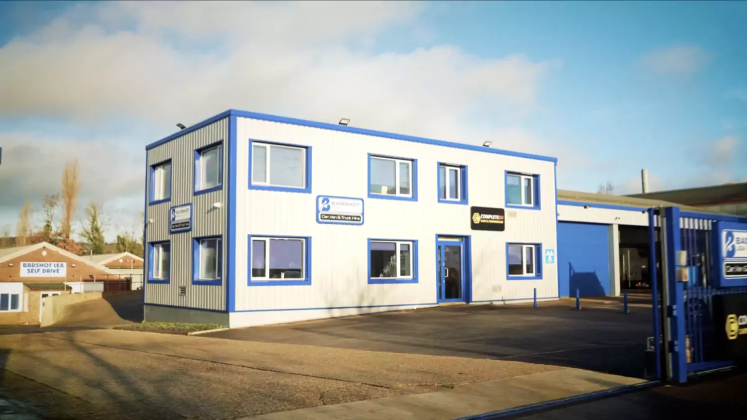 The Badshot Lea Vehicle Hire building and signage at Farnham Trading Estate