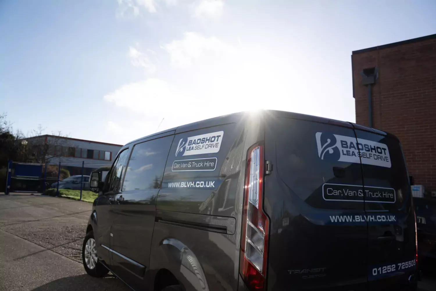 A Badshot Lea Vehicle Hire van in the company livery